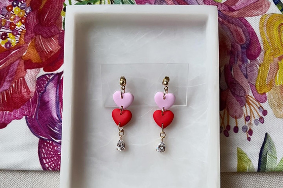 Drop earrings with pink and red love heart and cubic zirconia drop at bottom