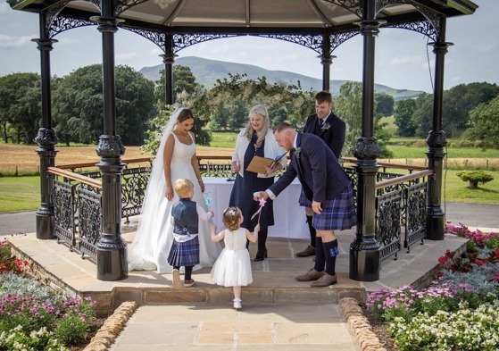 Yvonne Hannah, a humanist celebrant with Fuze Ceremonies, conducts a family wedding at Cornhill Castle