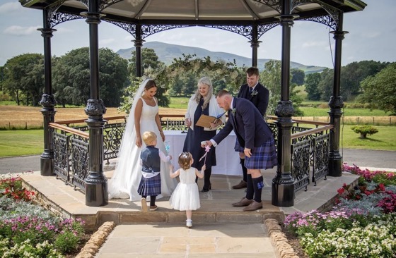 Yvonne Hannah, a humanist celebrant with Fuze Ceremonies, conducts a family wedding at Cornhill Castle