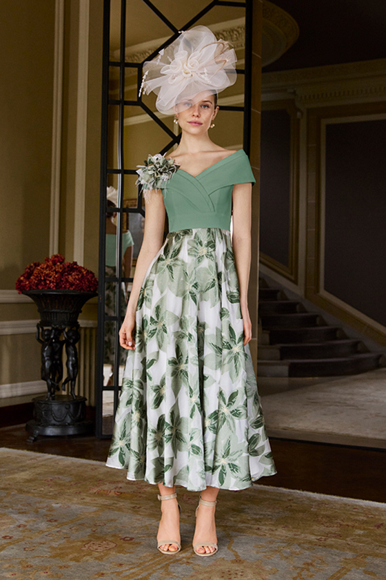 Green and white leaf print midi dress with off-shoulder neckline and fascinator