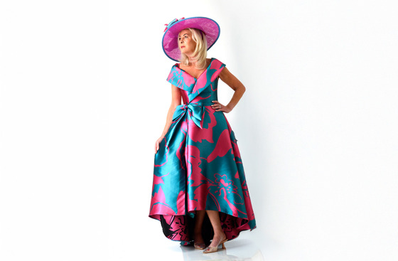 Teal and fuchsia statement occasion dress with wide brim hat