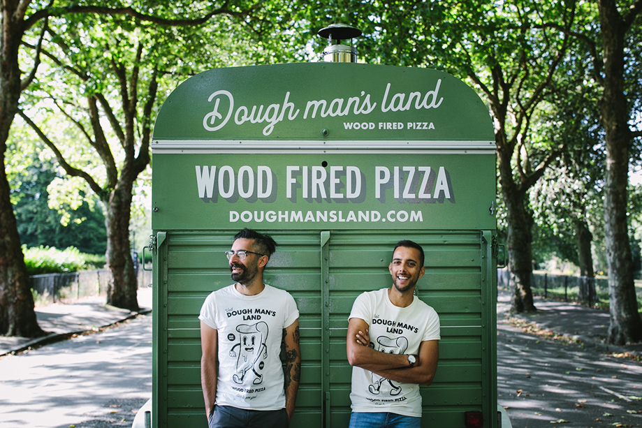 Owners of Dough Man's Land pose against green horsebox