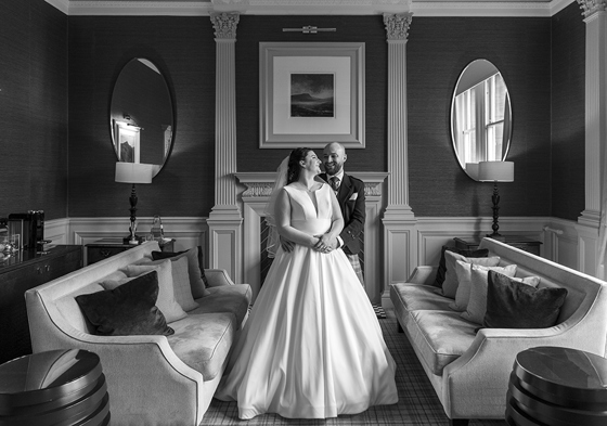 Black and white picture of a bride and her groom