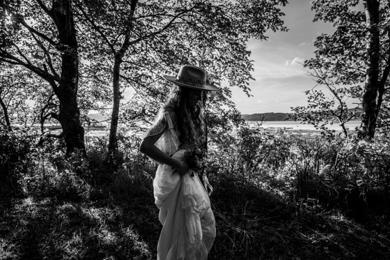 Boho bride in black and white image.