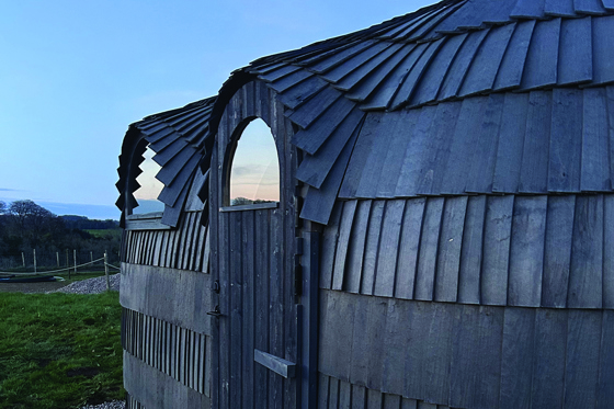 Exterior view of a glamping pod at Maycroft Retreat.