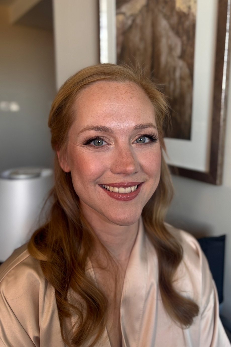 Bride smiles with glowy, natural makeup by Jill Rowan Makeup