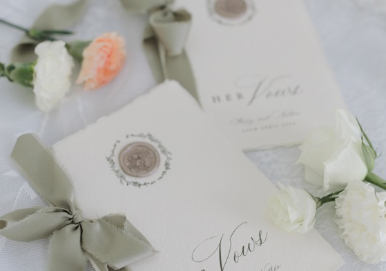 Handmade paper wedding vw books with gold wax seal and sage ribbon