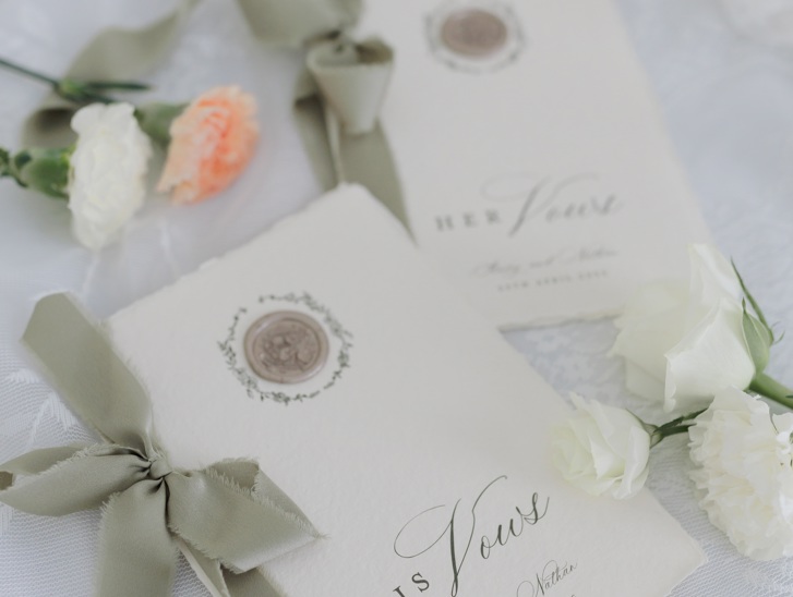 Handmade paper wedding vw books with gold wax seal and sage ribbon