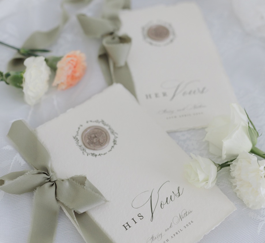 Handmade paper wedding vw books with gold wax seal and sage ribbon