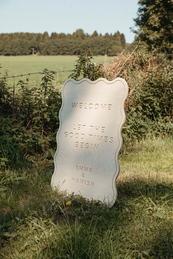 Wooden welcome sign at wedding organised by Speyside Events Company