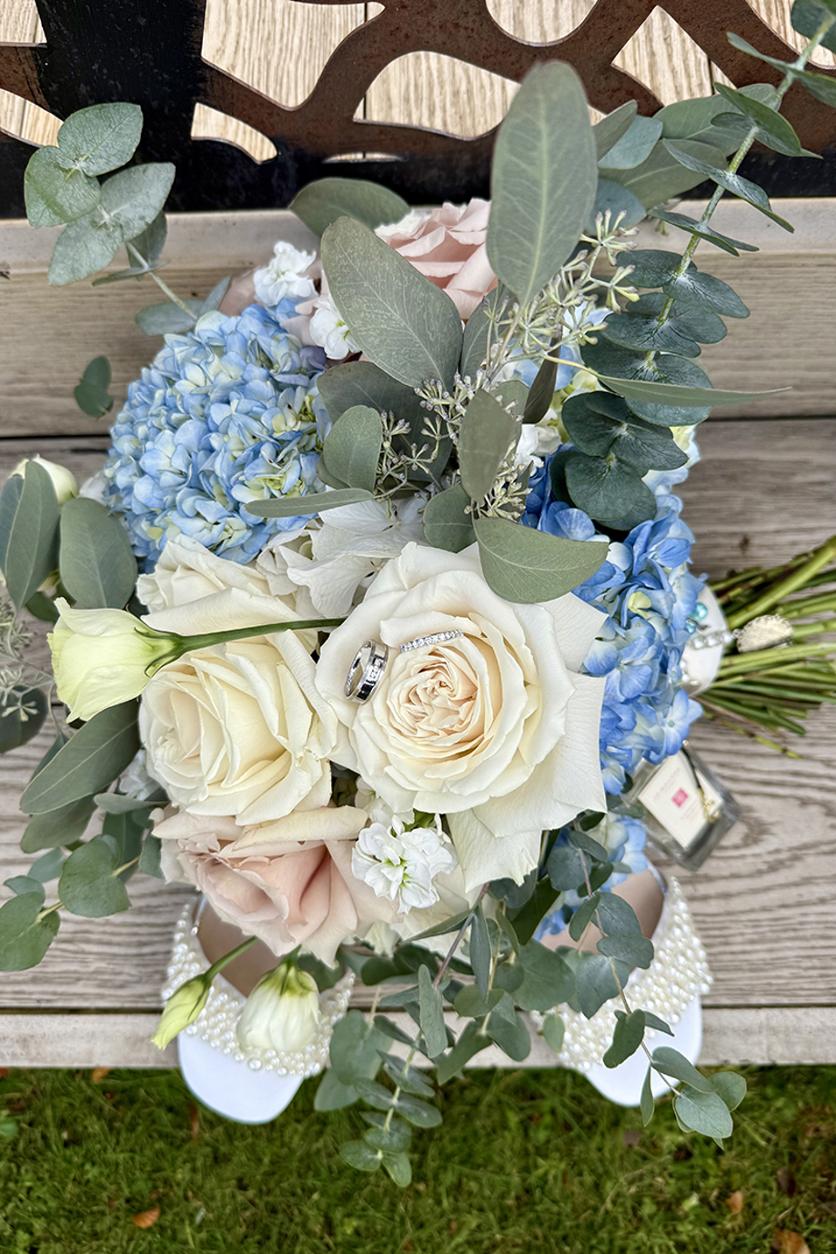 Wedding content creator Millar Moments details image, including bouquet and rings.