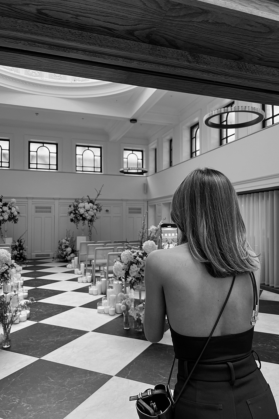 Black and white image of Ivoura capturing details of TTKS' The Collector's Hall photoshoot with Emily Shak.