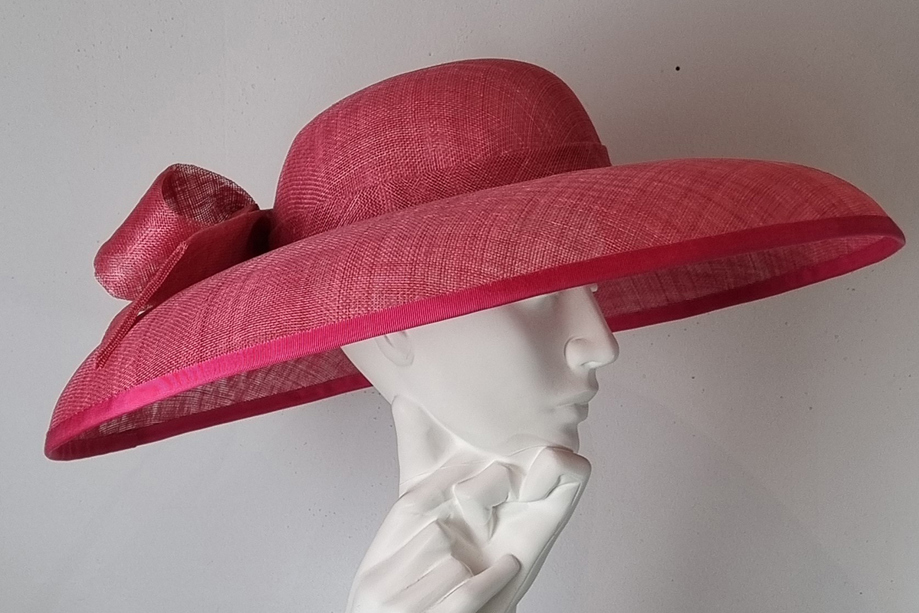 Raspberry Dior brim hat by Hazel Goodwin Millinery