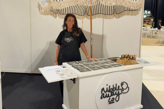 Nibble Away Co wedding catering cart at the Scottish Wedding Show in Glasgow, showcasing grazing table and charcuterie cup service