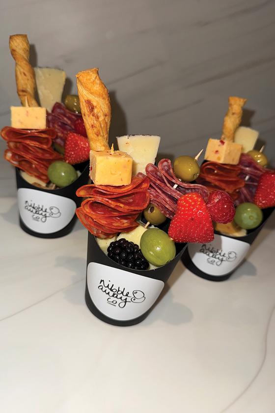 Nibble Away Co charcuterie cups with cured meats, cheese, olives and fresh fruit, ideal for Scottish wedding catering