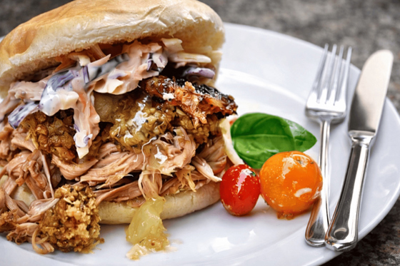 Pulled pork burger with slaw and garnish served as relaxed wedding catering by The Tasty Hog Company