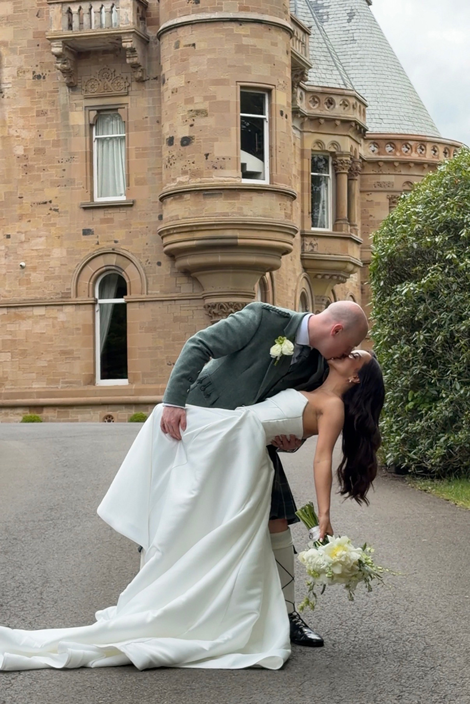 Navae Creative wedding content creator close-up of a bride and groom kissing under a wedding veil