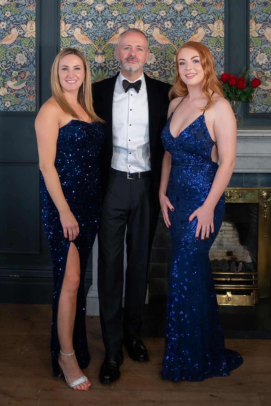 Copper Blonde wedding band trio dressed for a formal wedding performance at an elegant venue