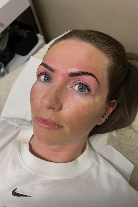 Close-up of a Browz & Bronze by Leah client following a professional eyebrow shaping and tint treatment.