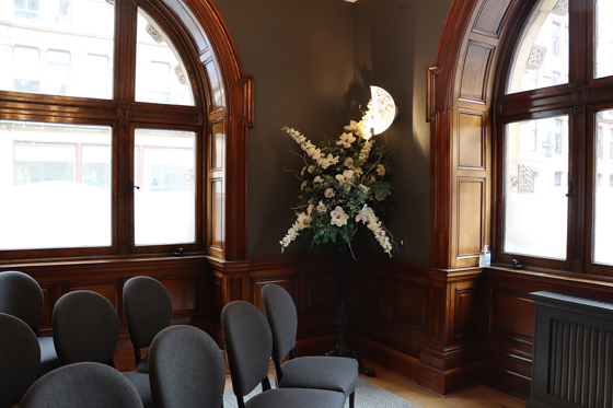 Bouquet on stand in corner of ceremony room at 23 Montrose Street and City Chambers.