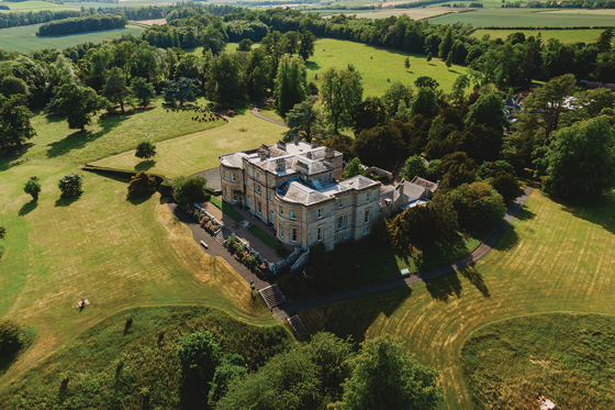 View from above of Newton Don and its surrounded parklands and woodland.