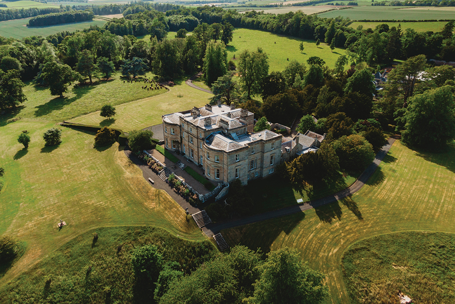 View from above of Newton Don and its surrounded parklands and woodland.