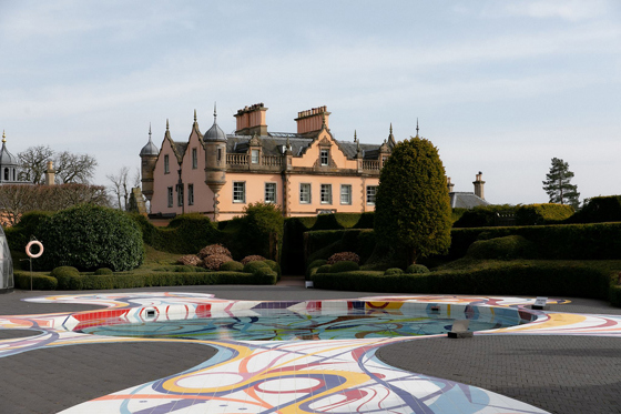 Exterior of Bonnington House at Jupiter Artland with landscaped gardens and colourful outdoor pool