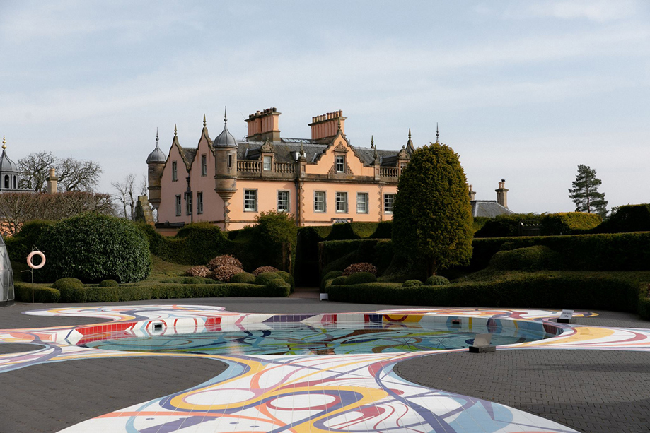 Exterior of Bonnington House at Jupiter Artland with landscaped gardens and colourful outdoor pool