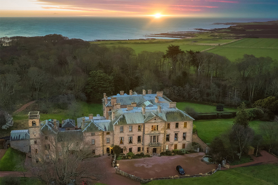 Cambo House from above with sea in background at sunrise