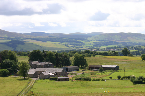 Wide countryside view of Cormiston Farm and surrounding fields in the Clyde Valley