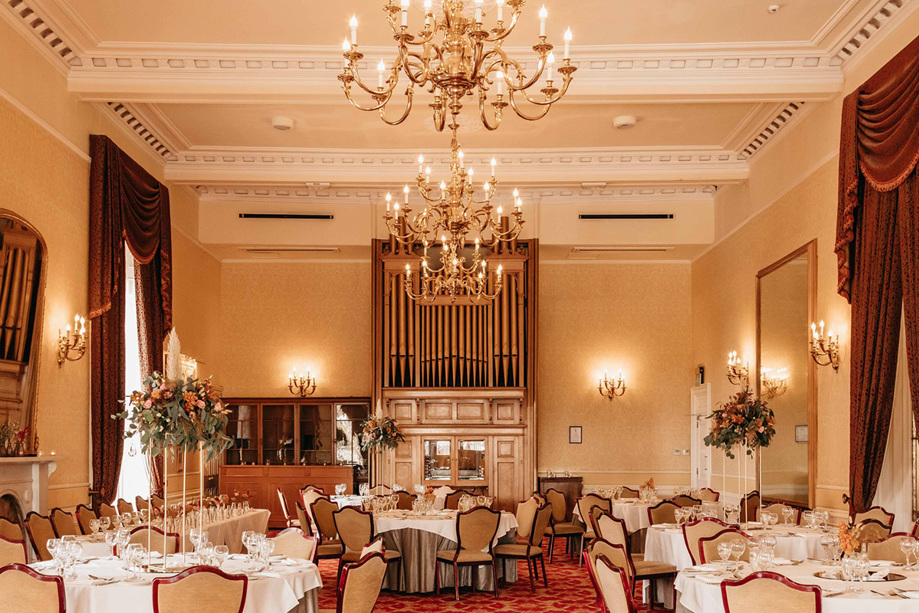 The Drawing Room at Crieff Hydro wedding meal with chandeliers and candlesticks