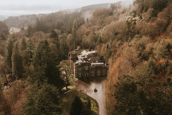 Drumtochty Castle and surrounding woodlands photographed from above.