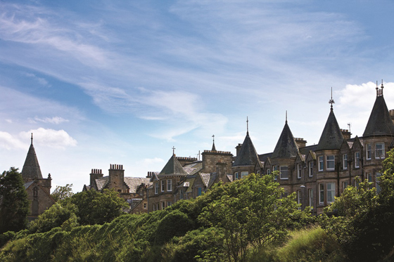 View of the skyline from Hotel du Vin St Andrews, with turrets and treetops in sight.