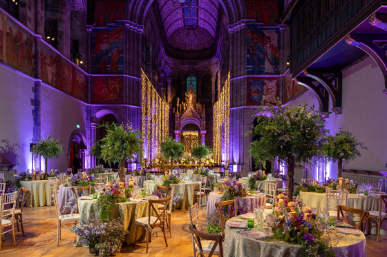 Wedding reception set up inside Mansfield Traquair with purple uplighting