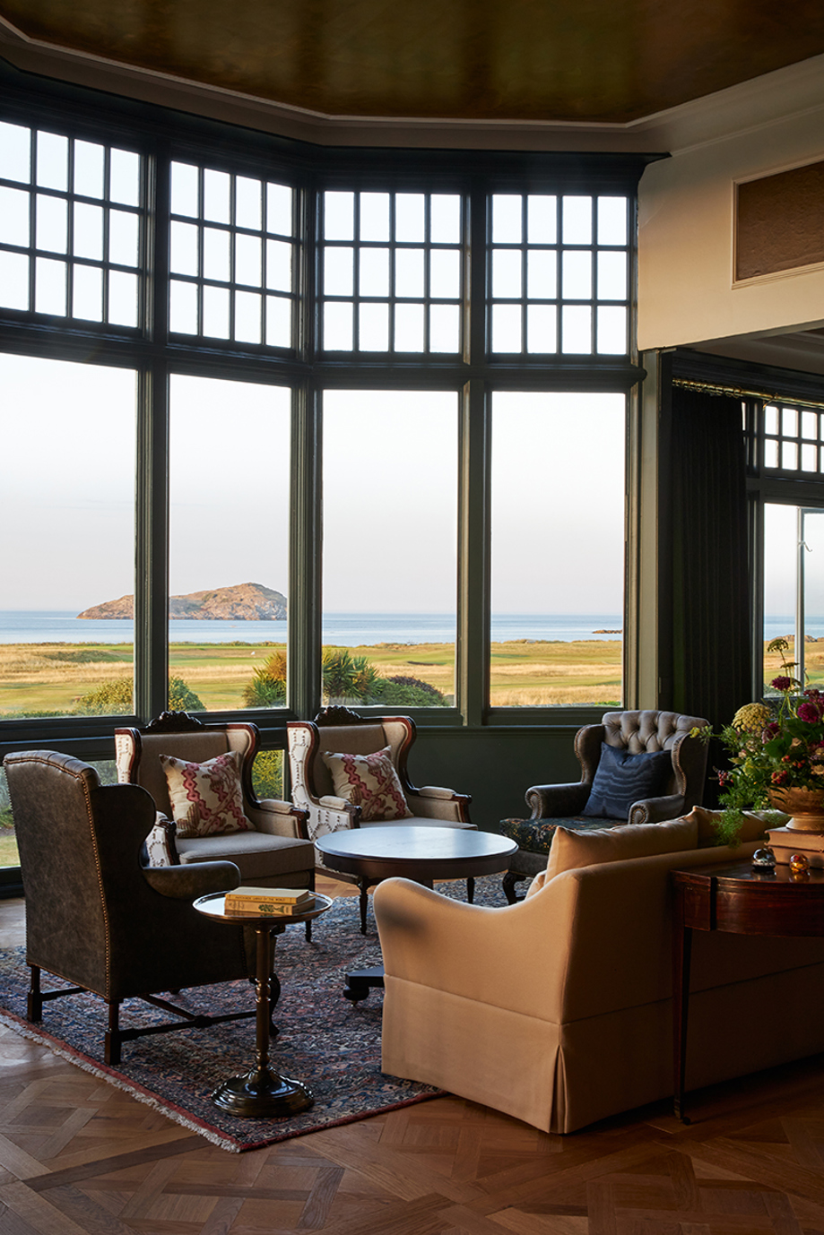 Marine North Berwick lounge with floor-to-ceiling windows overlooking the golf course and coastline