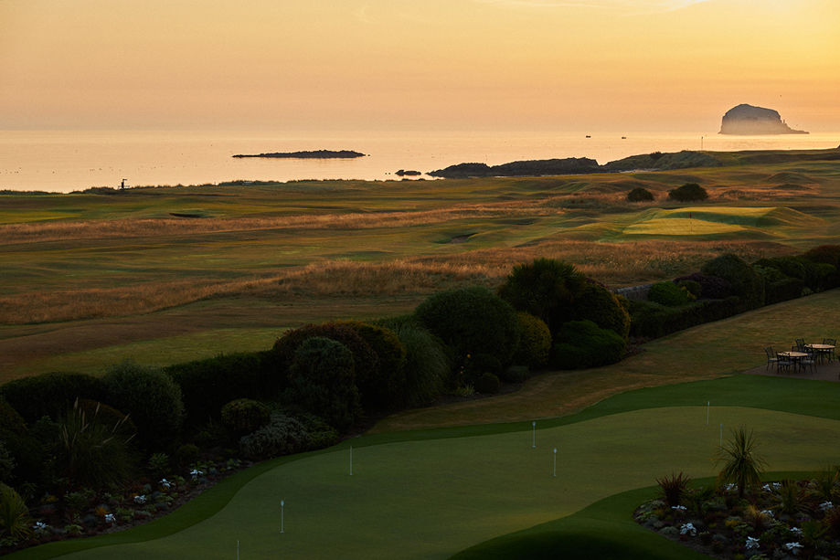 Sunset view over the golf course at Marine North Berwick with coastal skyline and sea in the distance