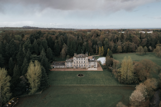 Aerial view of Melville Castle and its surrounding Scottish estate and grounds.
