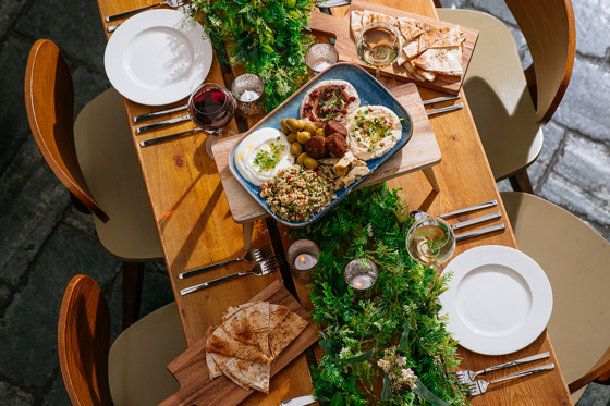 View from above of table with paddle serving platters at BAaD Glasgow.