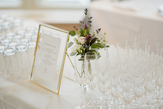 Wedding welcome drinks display at The Balmoral Hotel with champagne flutes and framed signage on table