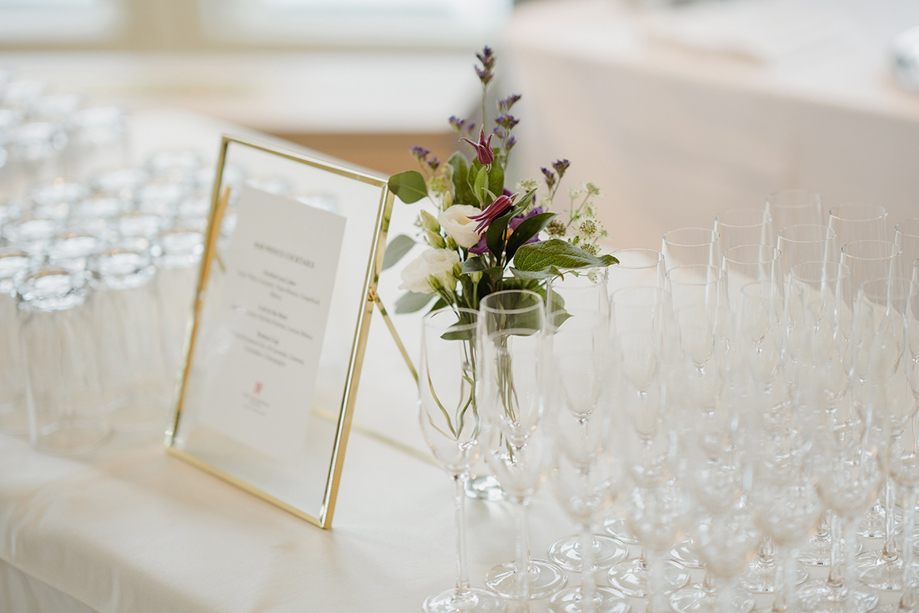 Wedding welcome drinks display at The Balmoral Hotel with champagne flutes and framed signage on table