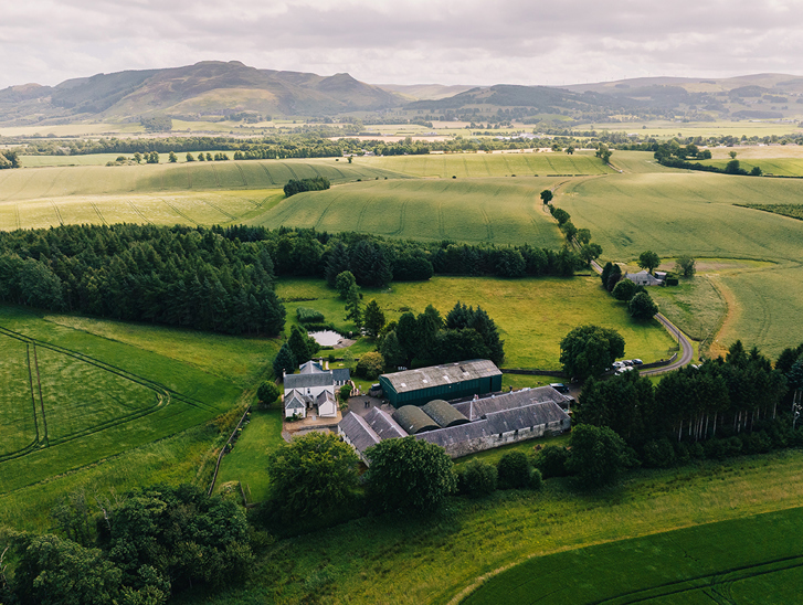 Drone view of Wed in a Shed in Perthshire with hills in background