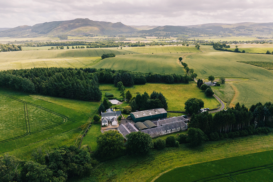 Drone view of Wed in a Shed in Perthshire with hills in background