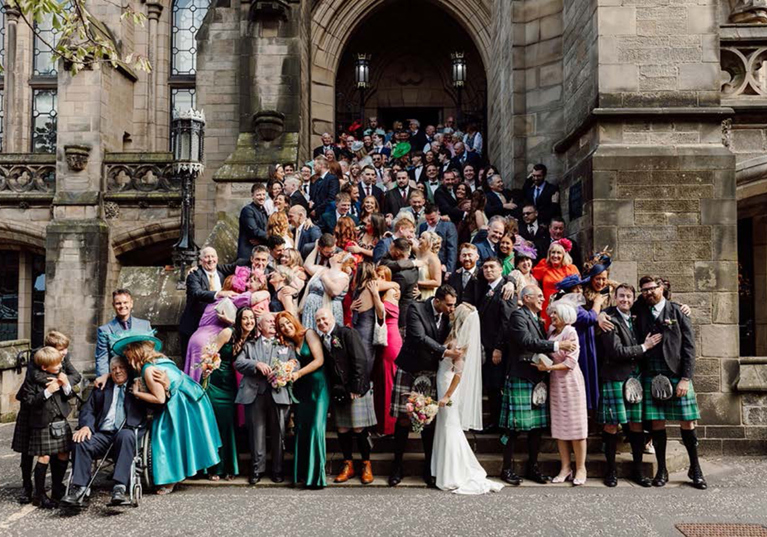 Group shot outside the Memorial Chapel at the Univeristy of Glasgow.