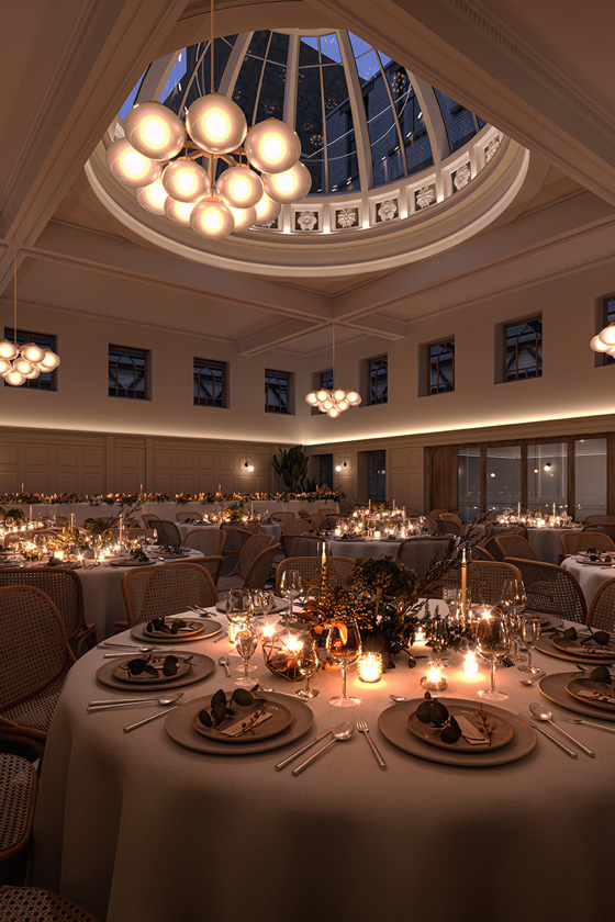 Candlelit wedding meal with round tables at The Collector's Hall, with glass dome illuminating the room.