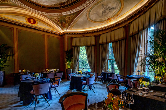 Bonnar's Dining Room at The Scott Hotel in Edinburgh, showing regal decor and imposing ceiling.
